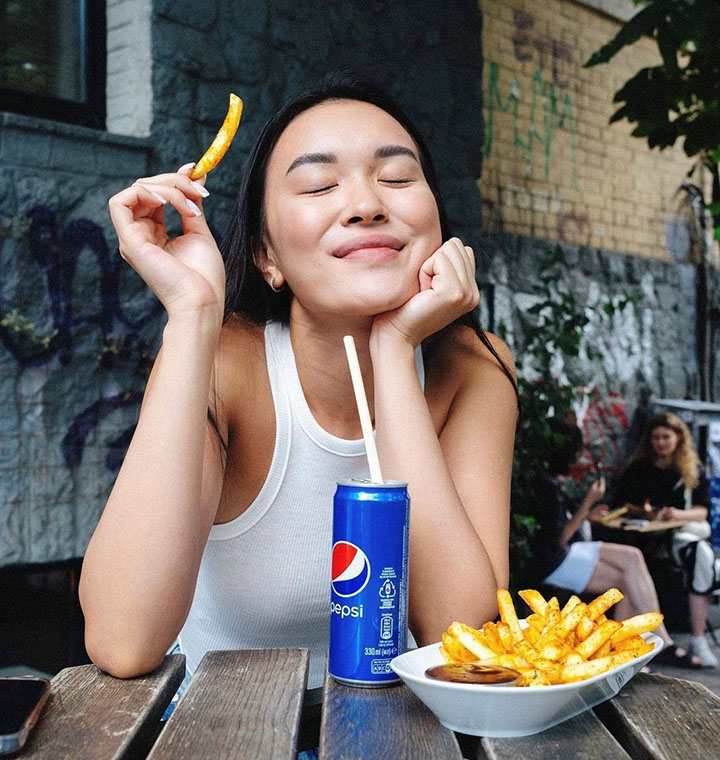 Woman enjoying a Pepsi